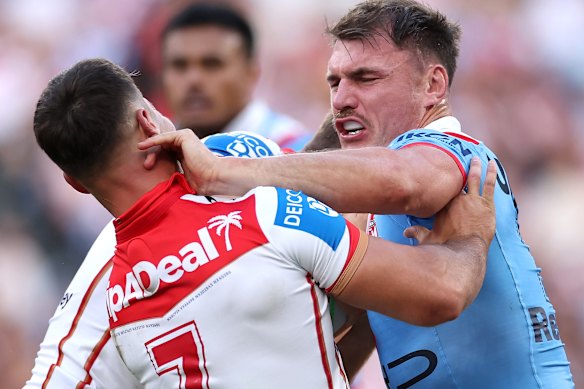 Angus Crichton gets a hand in the face of Lachlan Ilias.
