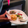 Qantas business class passengers on international flights still get fancy meals (above) but don’t expect similar on a domestic flight.