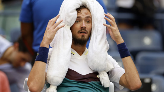 Daniil Medvedev cools down during his match against Andrey Rublev.