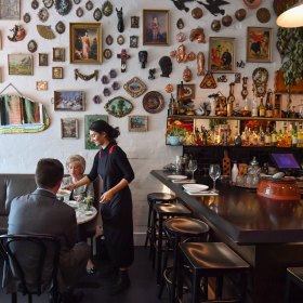Nab a prized seat at the bar.