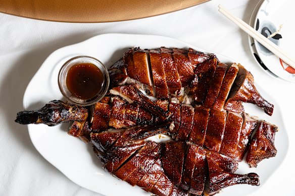 The signature “Pi-Pa” roast duck is spreadeagled to resemble a pear-shaped “pipa” lute (a traditional Chinese instrument).