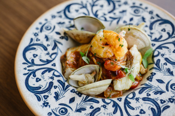 Spaghetti marinara with prawns, snapper, calamari, clams and cherry tomatoes.