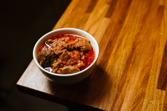 The marinated goat stew takes locally sourced goat and cooks it in a sauce of tomatoes, red capsicum, habaneros, onions and traditional Nigerian spices.