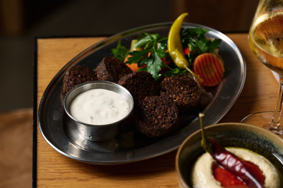 Falafel and condiments.