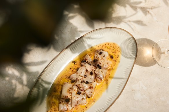 Omos, kingfish, lemon, Tombazis estate evoo and capers. 