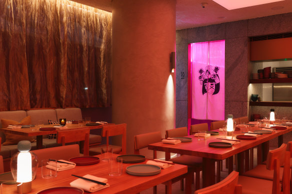 Genzo’s neon-lit dining room.