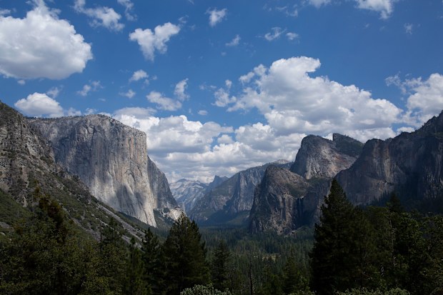A view of El Capitan, Half Dome and the Three Brothers in Yosemite National Park.