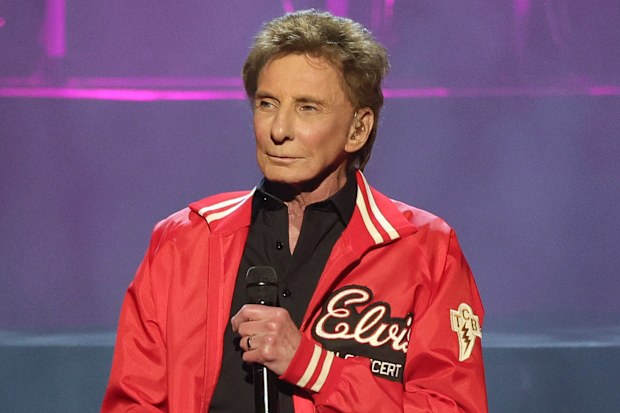 Barry Manilow performs a tribute to Elvis Presley during the first of his three “Record-Breaking Charity Weekend Celebration” shows as part of his residency “Barry Manilow 