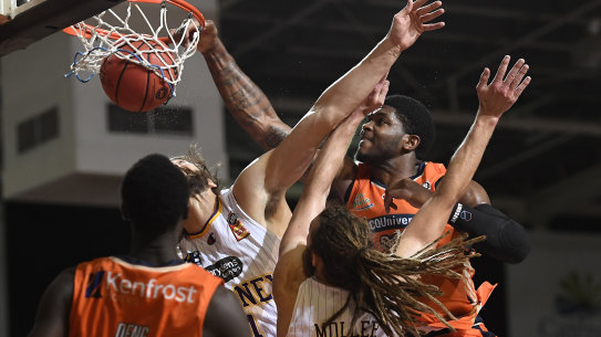 Cairns Taipans big man Cam Oliver left NBL fans bewildered on Saturday night, after producing one of the best dunks ever seen in the league with the one-hander put past Kings duo Jordan Hunt and Craig Moller.