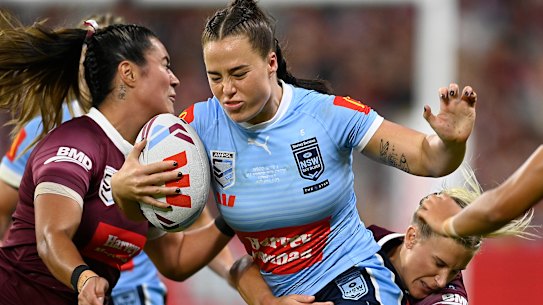 Isabelle Kelly takes on the Maroons defence.