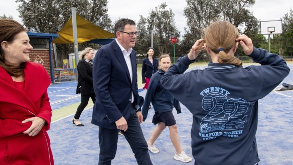 Then-premier Daniel Andrews announces a schools package on the campaign trail during the 2022 election campaign, with Planning Minister Sonya Kilkenny (left).