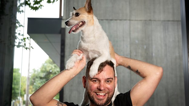 Brent Martin, with his Jack Russell, Penny, sells boutique dog treats for inner urban pooches.