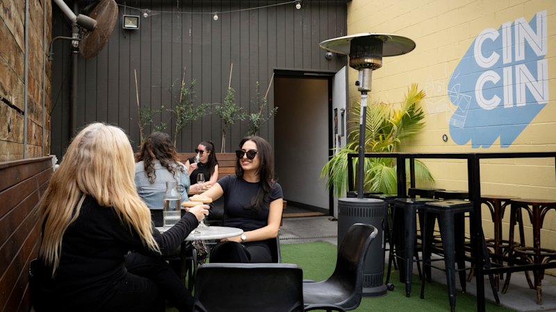 A cosy bar with a sunny courtyard hangout for cocktails and bocce