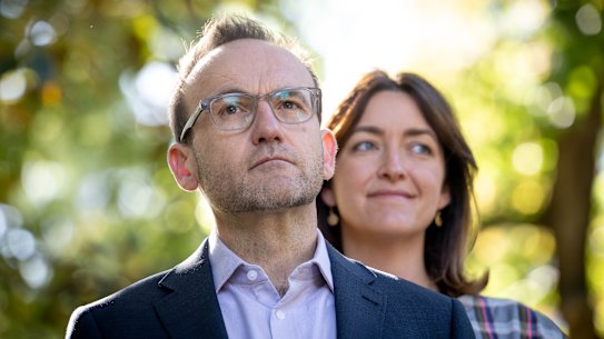 Greens leader Adam Bandt with Senator Steph Hodgins-May in Melbourne’s Treasury Gardens on Monday.
