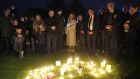 People light candles at a vigil in Leigh-on-Sea to honour British Conservative MP David Amess.