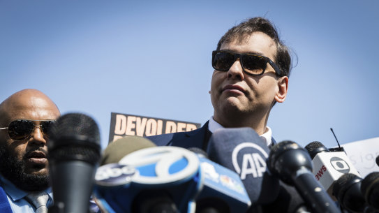 Defiant: US Representative George Santos speaks to the media outside the federal courthouse in Central Islip, NY. 