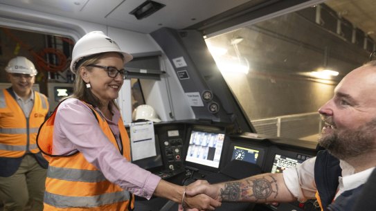 Jacinta Allan and the Minister for Public Transport Infrastructure Danny Pearson taking a train trip from Anzac Station to Parkville station 