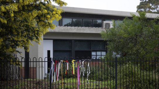 Ribbons on the fence at Beaumaris Primary School when the board of inquiry was announced in June.