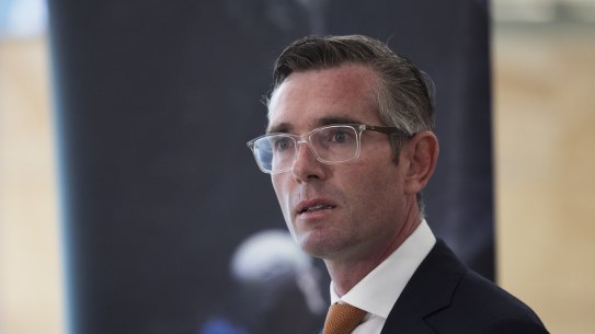 Premier Dominic Perrottet hit out at rail chaos overshadowing the return of international tourists to Sydney Airport on Monday.