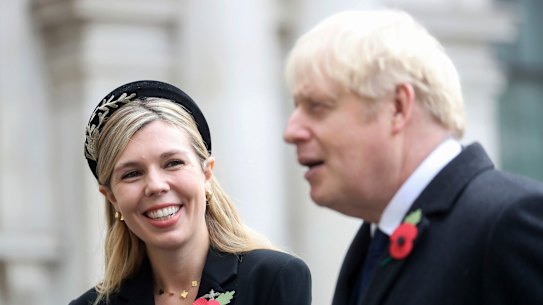Britain's Prime Minister Boris Johnson, right, with partner Carrie Symonds.