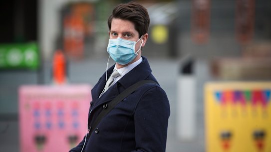 A mask wearer in the city on Friday