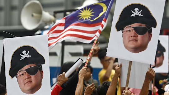 Wall Street bankers, Malaysian financier charged over $5.5b fraud