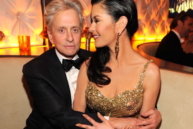 Michael Douglas and Catherine Zeta-Jones attends the 2013 Vanity Fair Oscar Party hosted by Graydon Carter at Sunset Tower on February 24, 2013 in West Hollywood, California.