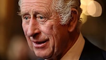 King Charles III speaks with guests during a reception and ceremony commemorating the 50th anniversary of the Resettlement of British Asians from Uganda in the UK, at Buckingham Palace in London, Wednesday Nov. 2, 2022 