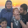 Palestinian poet Mosab Abu Toha with his family in an undated photo. They are now in Cairo.