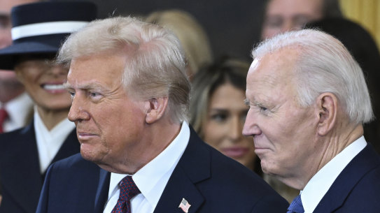 The president Joe Biden and Donald Trump stand together before the start of Trump’s inauguration in January.