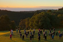 Guests practice Qi Gong as the sun rises over the Gold Coast hinterland.