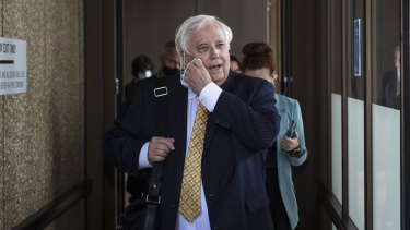 Clive Palmer outside Federal Court .