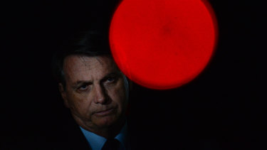 President of Brazil Jair Bolsonaro reacts during a conference with the press and supporters at Alvorada Palace on June 05, 2020 in Brasilia, Brazil.