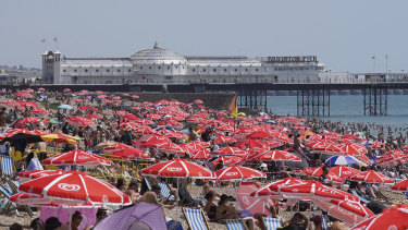 No room to move on Brighton Beach as people try to find some relief from the scorching heat in England.