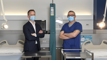 Professor Andrew Udy and Professor David Pilcher are keeping a close on on Australia's coronavirus hospital admissions.