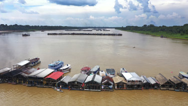 Dredging barges operated by illegal miners converge on the Madeira river, a tributary of the Amazon River, searching for gold in November.