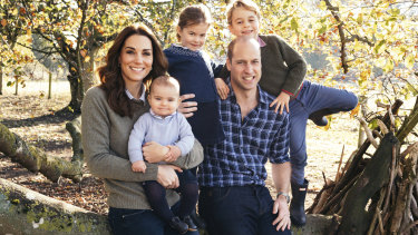 Prince William and Kate, Duchess of Cambridge, with their children Prince George, right, Princess Charlotte, centre, and Prince Louis at Anmer Hall in Norfolk. 