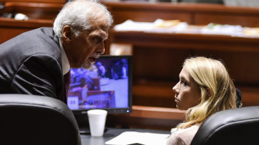 Brooke "Skylar" Richardson, right, talks to attorney Charles H. Rittgers in the courtroom before closing arguments.