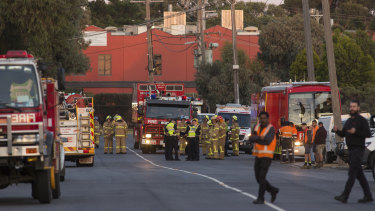 Firefighters at the factory in Thornycroft Road, Campbellfield.