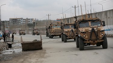 British soldiers with NATO-led Resolute Support Mission forces arrive at the site of an attack in Kabul, Afghanistan, last year. More cooperation would not necessarily mean NATO forces in the Asia Pacific.
