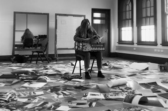 Lillian OâNeil, photographic collage artist, in her studio, surrounded by hundreds of photos.
