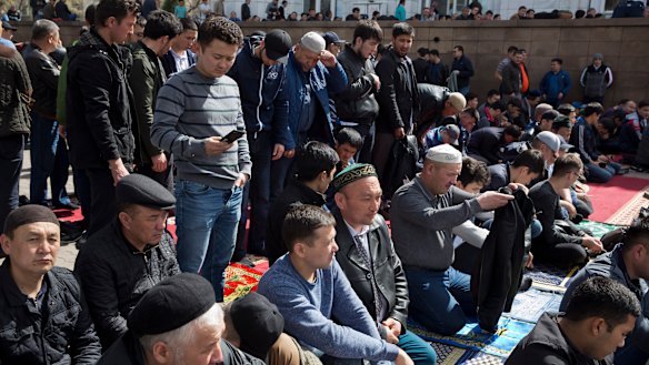 Men pray at a mosque in Almaty, Kazakhstan. 