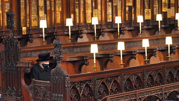 Queen Elizabeth II sits alone in St George’s Chapel ahead of the funeral of Prince Philip.