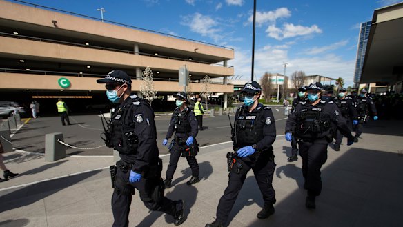 Police arriving at Chadstone Shopping Centre on Sunday.