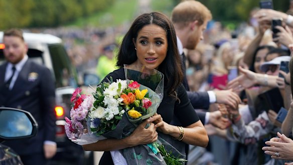 Meghan, the Duchess of Sussex, with mourners.