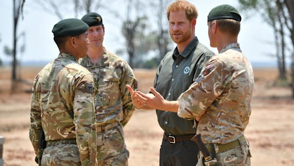 Prince Harry at the memorial site dedicated to guardsman Mathew Talbot in Liwonde National Park. Mr Talbot lost his life on an anti-poaching patrol in May.