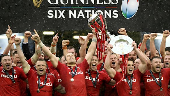Jubilation: Wales players celebrate success against Ireland in Cardiff.