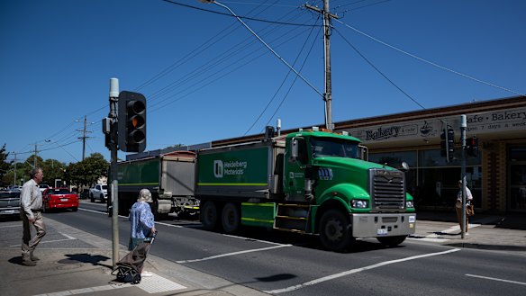A quarry truck drives through a pedestrian crossing on Westernport Road. 