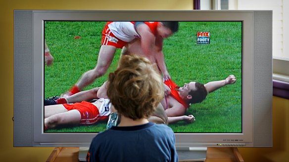 AFL footy on the box.