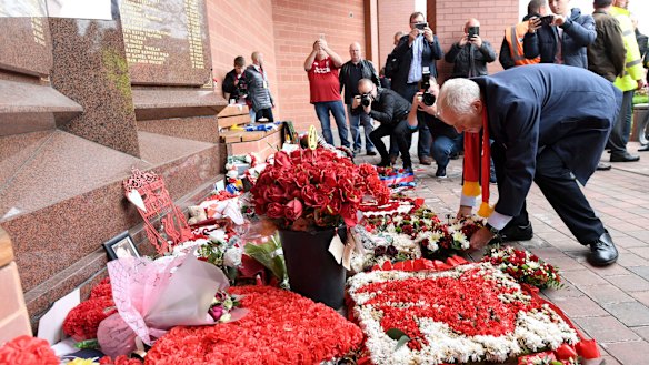 Memorial: Britain's opposition Labour Party leader Jeremy Corbyn visits the Hillsborough memorial at Anfield stadium in Liverpool, before attending the match between Liverpool and Southampton on September 22.